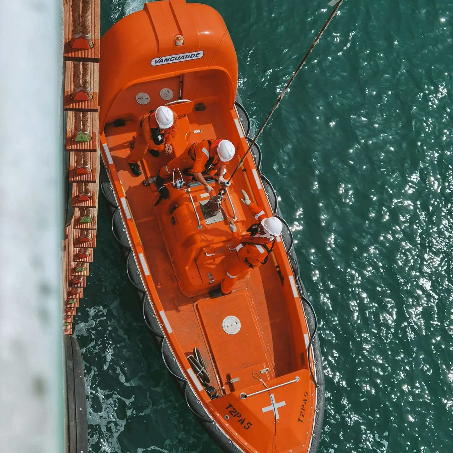 orange and white boat on water during daytime